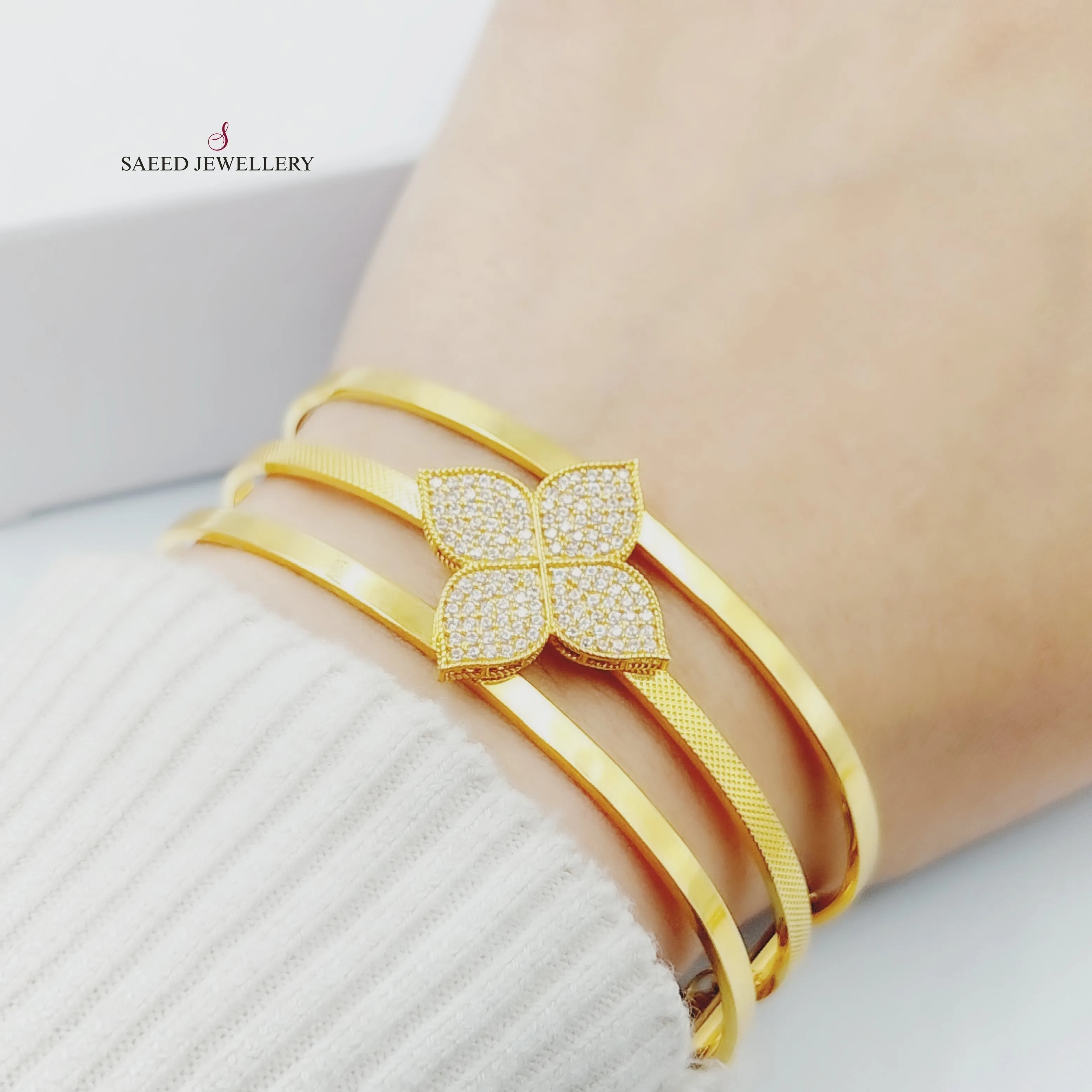 Zircon Studded Fancy Bangle Bracelet